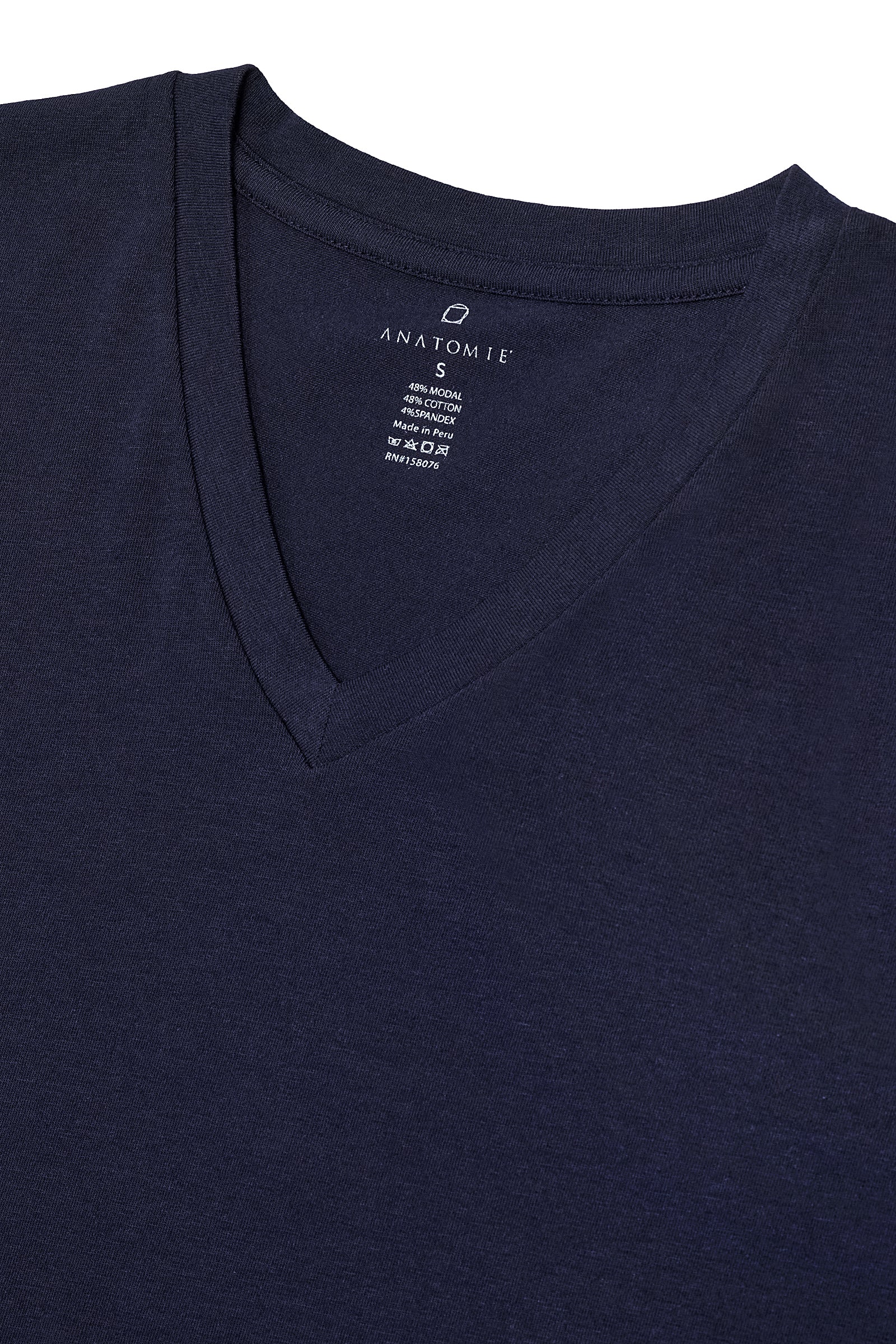 The Best Travel Top. Flat Lay of a Men's Vince Top in Navy.